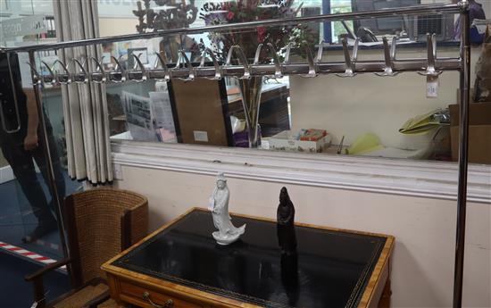 A contemporary chrome coat / luggage rail W.200cm